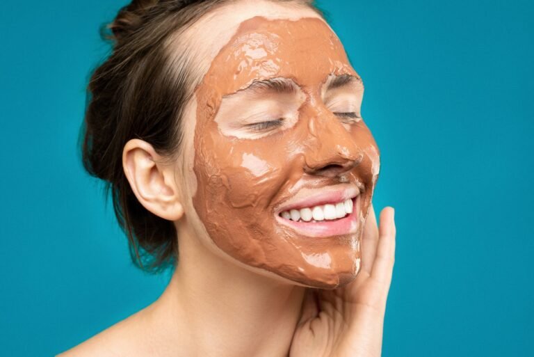 woman with clay mask on face